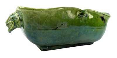 Lot 138 - C. H. BRANNAM, BARNSTAPLE - BARUM WARE GREEN GLAZE GROTESQUE HANDLED PLANTER POT