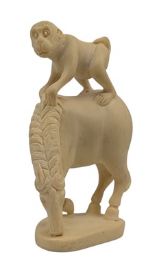 Lot 77 - 20TH CENTURY JAPANESE IVORY NUT CARVING FIGURE OF A MONKEY ON HORSEBACK
