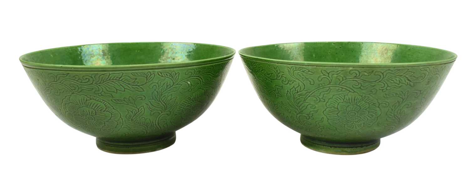 Lot 4 - PAIR OF QING YONGZHENG GREEN GLAZED INCISED FLORAL BOWLS
