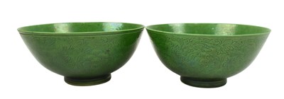 Lot 4 - PAIR OF QING YONGZHENG GREEN GLAZED INCISED FLORAL BOWLS