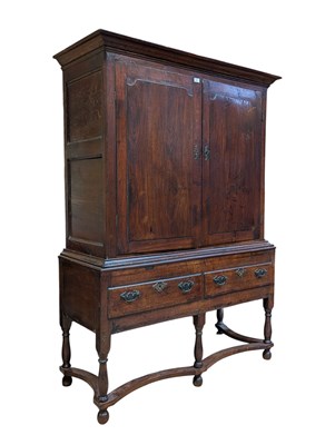 Lot 259 - 17TH CENTURY OAK WOOD LINEN PRESS CUPBOARD ON STAND