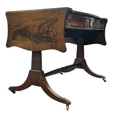 Lot 569 - GEORGE III 19TH CENTURY FLAME MAHOGANY DROP-LEAF WRITING TABLE DESK