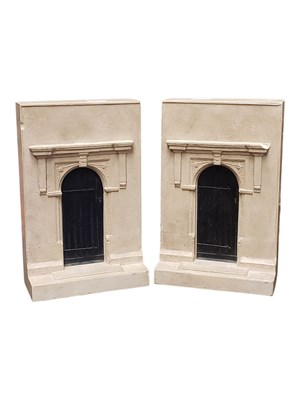 Lot 277 - A PAIR OF LATE 20TH CENTURY TIMOTHY RICHARDS COMPOSITION FASCADE BOOKENDS