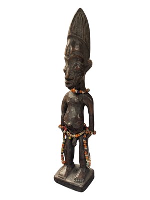 Lot 274 - 20TH CENTURY NIGERIAN YORUBA IBEJI CARVED WOODEN FIGURE