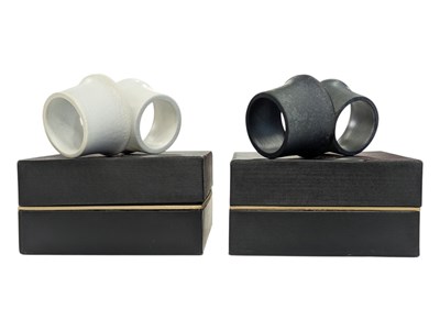 Lot 108 - L'OBJET, UNITED STATES - TWO SETS OF DESIGNER BOXED NAPKIN RINGS