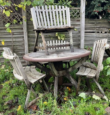 Lot 614 - WOODEN & IRON-BOUND ROUND PUB GARDEN TABLE WITH FOUR BENCH SEATS