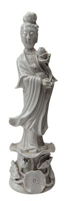 Lot 79 - 20TH CENTURY CHINESE BLANC DE CHINE FIGURE OF GUANYIN 观音立像