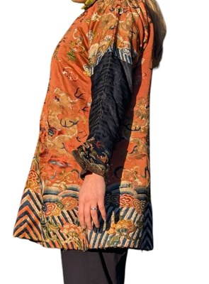 Lot 50 - 19TH CENTURY QING DYNASTY CHILD'S SILK EMBROIDERED ROBE 清 十九世纪杏地龙纹童服