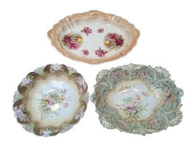 Lot 450 - THREE 20TH CENTURY CONTINENTAL CERAMIC FLORAL SERVING PLATES / BOWLS