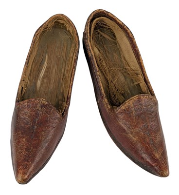 Lot 137 - PAIR OF MIDDLE EASTERN LEATHER BOUND FEET SLIPPERS
