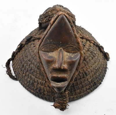 Lot 86 - AFRICAN TRIBAL HAT DECORATED WITH TWO WOODEN CARVED MASKS