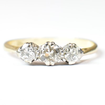 Lot 236 - 18CT GOLD & DIAMOND THREE STONE RING