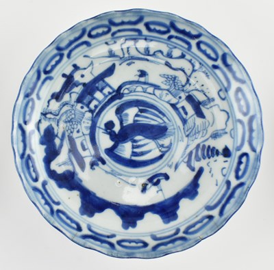 Lot 11 - THREE QING / REPUBLIC PERIOD BLUE AND WHITE PLATES 清/民国 青花山水盘两个