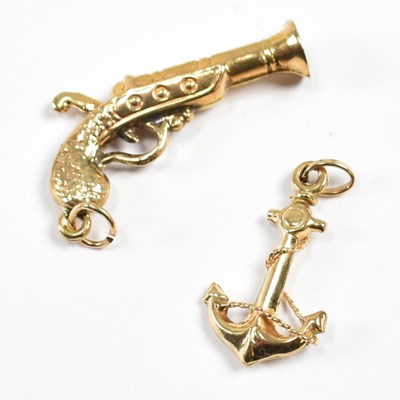 Lot 299 - TWO 9CT GOLD CHARMS ANCHOR & PISTOL