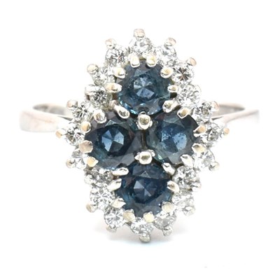 Lot 326 - HALLMARKED 18CT WHITE GOLD SAPPHIRE & DIAMOND CLUSTER RING