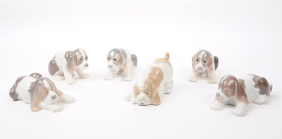 Lot 89 - LLADRO & NAO BY LLADRO - SIX HAND PAINTED PORCELAIN DOG FIGURES