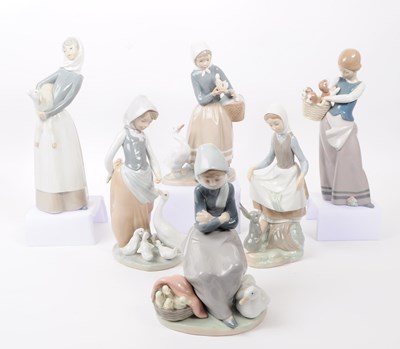 Lot 94 - SIX LLADRO HAND PAINTED PORCELAIN FIGURES OF LADIES WITH FARM ANIMALS