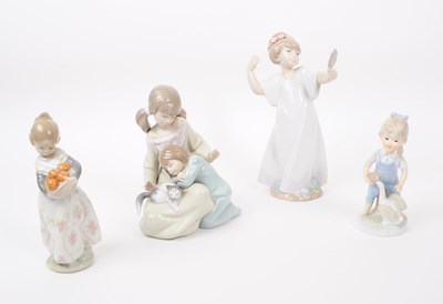 Lot 98 - LLADRO, SPAIN - THREE HAND PAINTED PORCELAIN FIGURES T/W ANOTHER