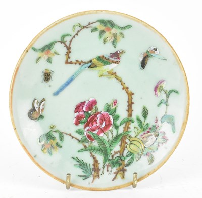 Lot 133 - QING CELADON GLAZE CANTON FAMILLE ROSE PLATE 清 豆青釉广彩花鸟碟