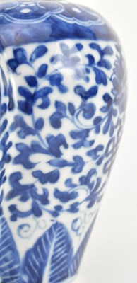 Lot 30 - QING DYNASTY BLUE AND WHITE TULIP VASE 清 青花缠枝莲六连瓶