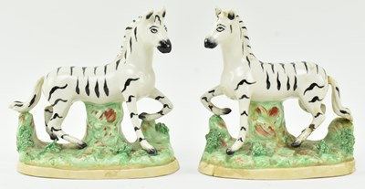 Lot 54 - EIGHT 19TH CENTURY STAFFORDSHIRE HAND PAINTED POTTERY ZEBRAS