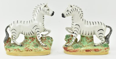 Lot 54 - EIGHT 19TH CENTURY STAFFORDSHIRE HAND PAINTED POTTERY ZEBRAS