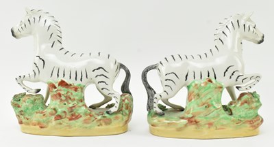 Lot 54 - EIGHT 19TH CENTURY STAFFORDSHIRE HAND PAINTED POTTERY ZEBRAS