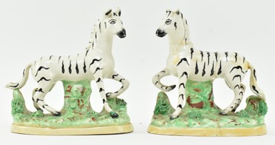 Lot 54 - EIGHT 19TH CENTURY STAFFORDSHIRE HAND PAINTED POTTERY ZEBRAS