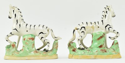 Lot 54 - EIGHT 19TH CENTURY STAFFORDSHIRE HAND PAINTED POTTERY ZEBRAS