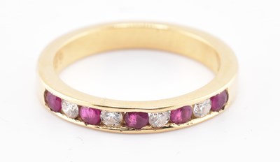 Lot 161 - HALLMARKED 18CT GOLD RUBY & DIAMOND RING