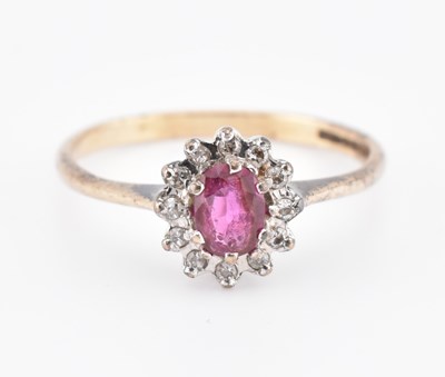 Lot 288 - HALLMARKED 9CT GOLD RUBY & DIAMOND CLUSTER RING