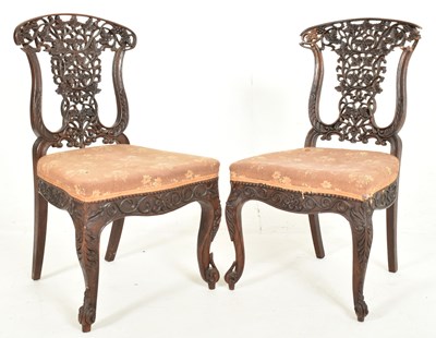 Lot 307 - PAIR OF ANGLO-COLONIAL INDIAN 19TH CENTURY CARVED HARDWOOD CHAIRS