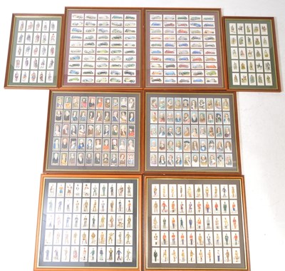 Lot 494 - A LARGE COLLECTION OF FRAMED AND GLAZED VINTAGE 2OTH CENTURY CIGARETTE CARDS