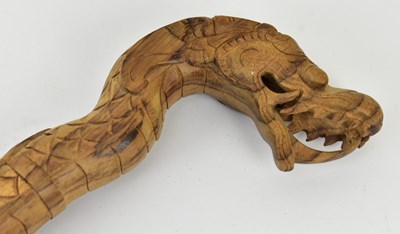 Lot 217 - HARDWOOD CARVED CANE IN FORM OF A DRAGON 实木雕刻拐杖