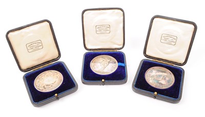 Lot 477 - THREE JOHN PINCHES EDWARDIAN CLIFTON COLLEGE MEDALS