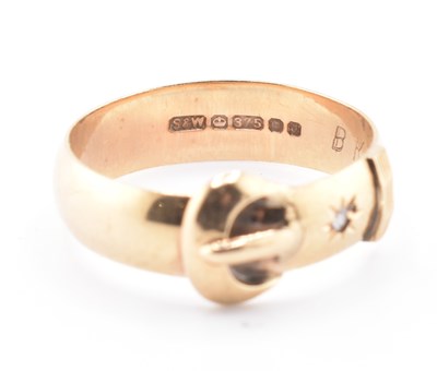 Lot 80 - HALLMARKED 9CT GOLD RUBY & DIAMOND BUCKLE RING