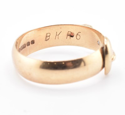 Lot 80 - HALLMARKED 9CT GOLD RUBY & DIAMOND BUCKLE RING