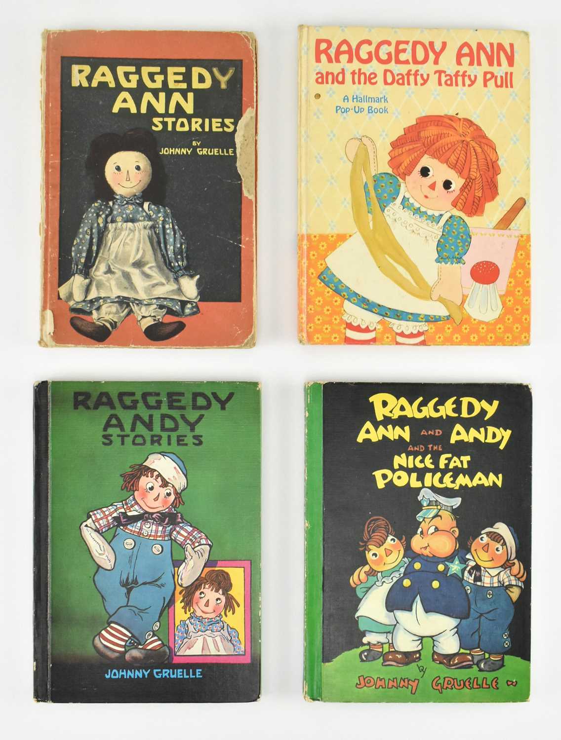 Lot 172 - CHILDREN'S LITERATURE. FOUR VINTAGE RAGGEDY ANN & RAGGEDY ANDY BOOKS