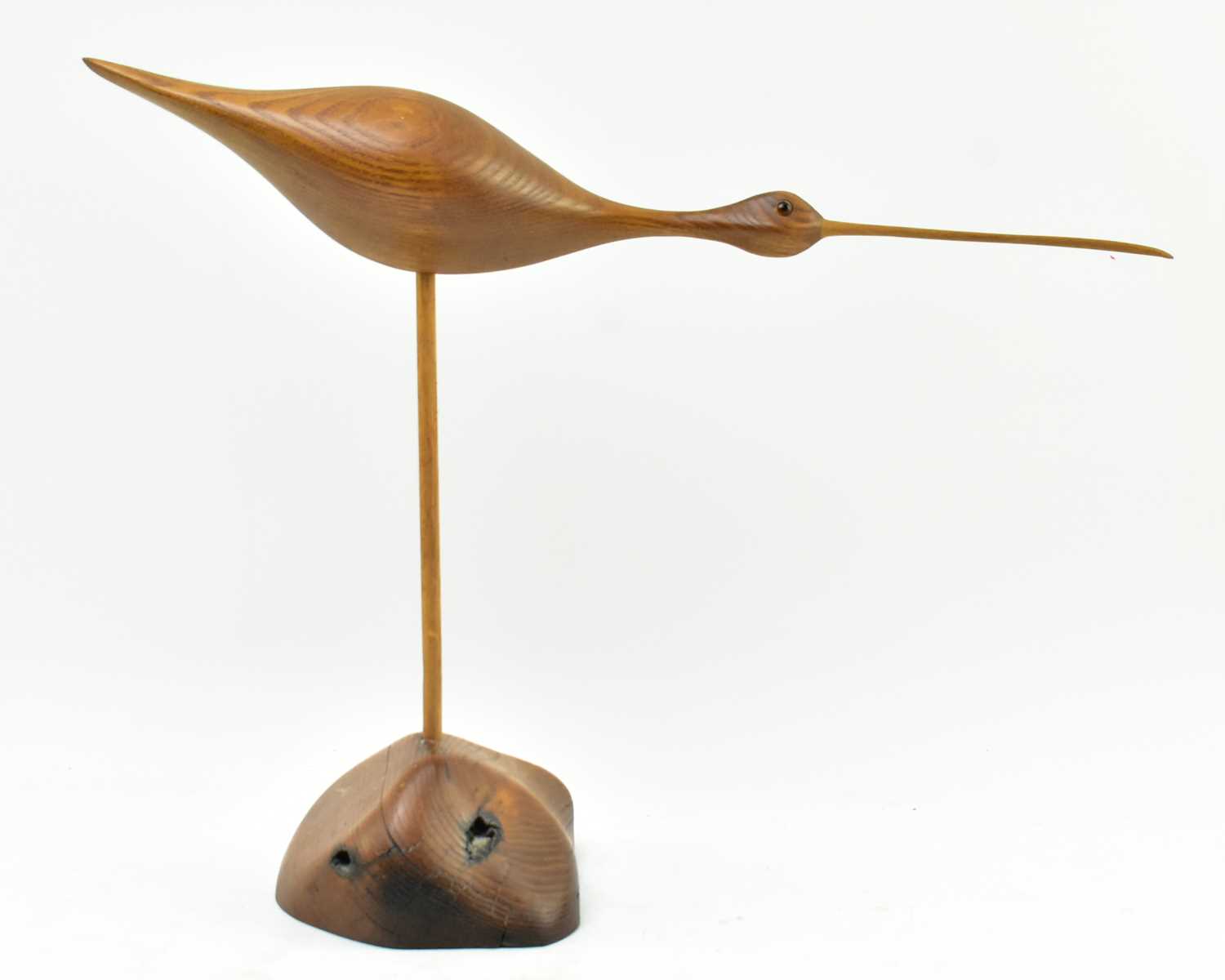 Lot 76 - ANDY POUCH - CARVED CHESTNUT SHORE BIRD SCULPTURE