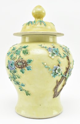 Lot 6 - QING YELLOW GROUND FLORAL RELIEF VASE 清 王炳荣花卉雕瓷瓶