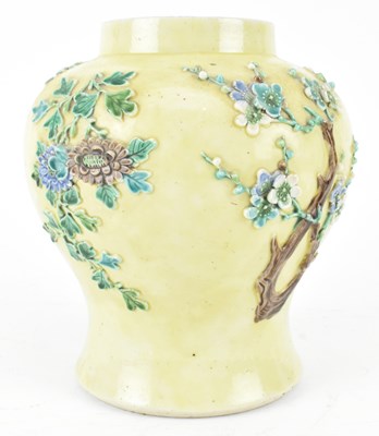 Lot 6 - QING YELLOW GROUND FLORAL RELIEF VASE 清 王炳荣花卉雕瓷瓶
