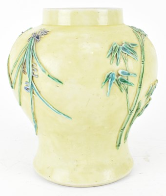 Lot 6 - QING YELLOW GROUND FLORAL RELIEF VASE 清 王炳荣花卉雕瓷瓶