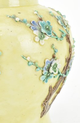 Lot 6 - QING YELLOW GROUND FLORAL RELIEF VASE 清 王炳荣花卉雕瓷瓶