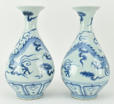 Lot 155 - PAIR OF BLUE AND WHITE "DRAGON" VASES 青花龙纹玉壶春瓶一对