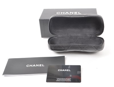 Lot 208 - CHANEL - GLASSES CASE AND BOX