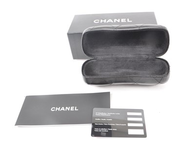 Lot 208 - CHANEL - GLASSES CASE AND BOX