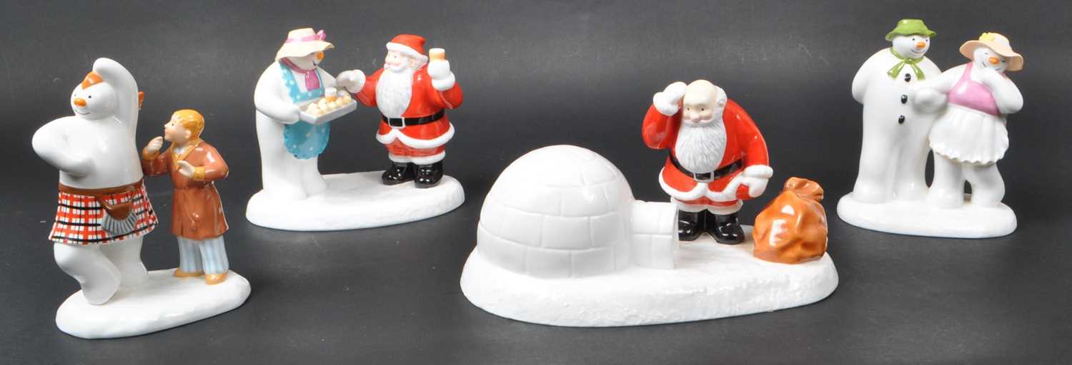 Lot 34 - COALPORT - FOUR BONE CHINA 'THE SNOWMAN' FIGURINES