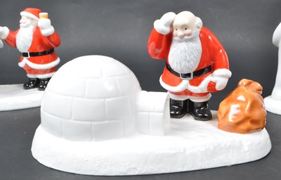 Lot 34 - COALPORT - FOUR BONE CHINA 'THE SNOWMAN' FIGURINES