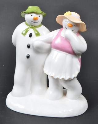 Lot 34 - COALPORT - FOUR BONE CHINA 'THE SNOWMAN' FIGURINES