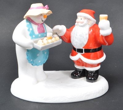 Lot 34 - COALPORT - FOUR BONE CHINA 'THE SNOWMAN' FIGURINES